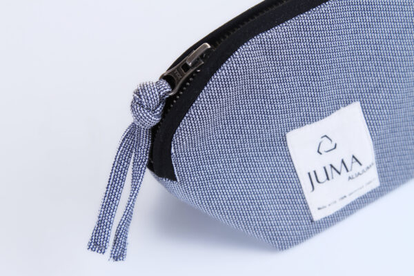 Juma | travel | bag | textured | sustainable fashion | green fashion | recycled rpet fashion | sustainable design