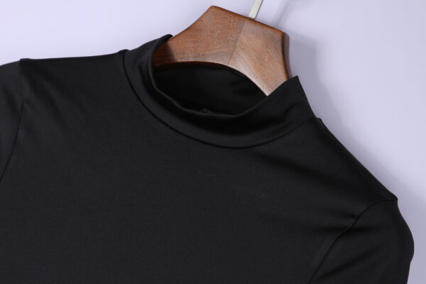 Juma | slim fit | sports | top | black | sustainable fashion | green fashion | recycled rpet fashion | sustainable design